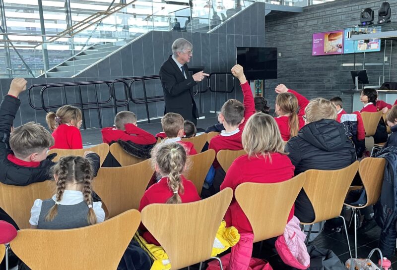 Mark Drakeford answers questions from a school group at the Senedd.
